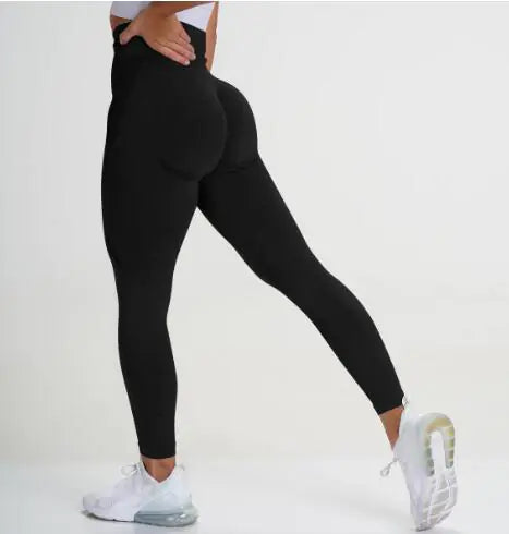 woman wearing yoga leggings for the gym or cardio