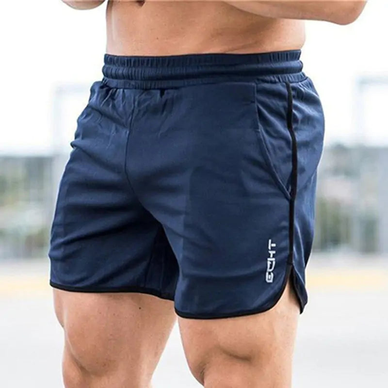 man wearing navy blue  drawstring shorts with pockets