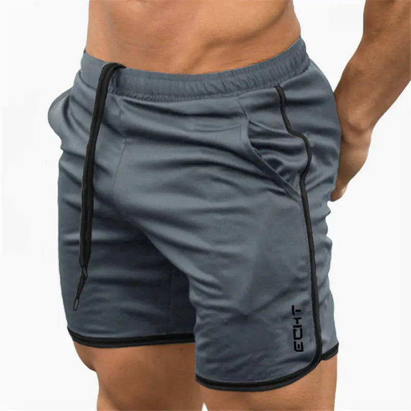 man wearing gray drawstring shorts with pockets